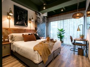 Voodi või voodid majutusasutuse Celestino Boutique Hotel & Spa toas