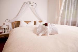 Voodi või voodid majutusasutuse Alpenhotel Ensmann toas