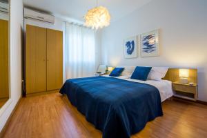 Postel nebo postele na pokoji v ubytování Apartments Tomislav