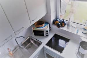 Kuchyň nebo kuchyňský kout v ubytování Ferienwohnung Osterdeich