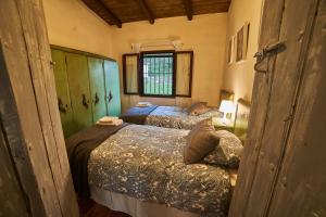 Postel nebo postele na pokoji v ubytování Valle Granado
