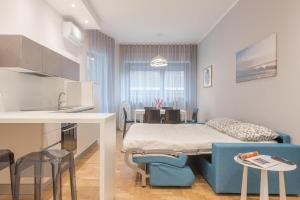 Кровать или кровати в номере Linda House