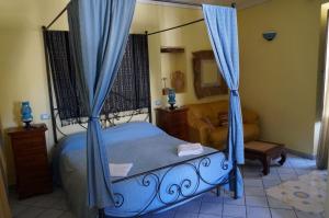מיטה או מיטות בחדר ב-Casa Matarazzo