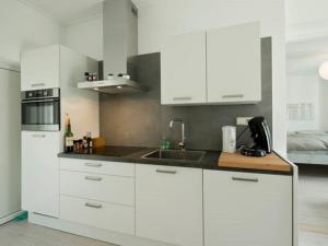 Η κουζίνα ή μικρή κουζίνα στο Vakantiewoning 71