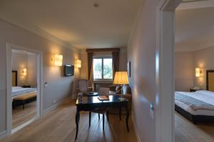Posteľ alebo postele v izbe v ubytovaní Hotel Palazzo San Lorenzo & Spa