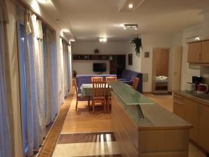 A kitchen or kitchenette at Mary Apartmanház Hévíz