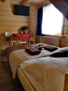Кровать или кровати в номере Pokoje goscinne u Jozka