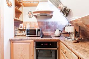 Kuchyňa alebo kuchynka v ubytovaní Apartament Bajeczna Góra Zakopane