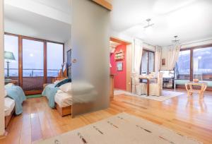 Posteľ alebo postele v izbe v ubytovaní Apartament Bajeczna Góra Zakopane