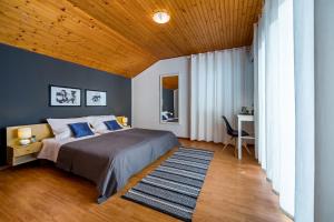Postel nebo postele na pokoji v ubytování Apartments Tomislav