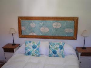 Ένα ή περισσότερα κρεβάτια σε δωμάτιο στο La Posada de Agustina