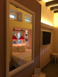Postel nebo postele na pokoji v ubytování B&B Verona Centro