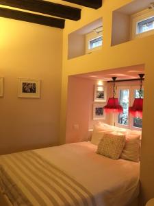 Postel nebo postele na pokoji v ubytování B&B Verona Centro