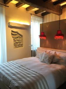 Postel nebo postele na pokoji v ubytování B&B Verona Centro