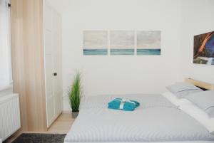 Island Apartment Budapestにあるベッド