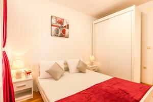 Katil atau katil-katil dalam bilik di Apartments Spalato