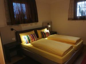 מיטה או מיטות בחדר ב-Chalet Mottolino