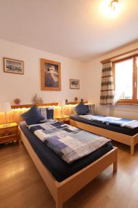 Postel nebo postele na pokoji v ubytování B&B Stiffler-Huus