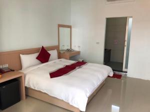 Letto o letti in una camera di Kai Cheng Inn 旅館134