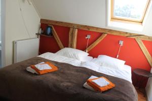 Postel nebo postele na pokoji v ubytování Boutique Hotel Nieuw Beusink