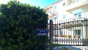 Certificato, attestato, insegna o altro documento esposto da Apartments Dani
