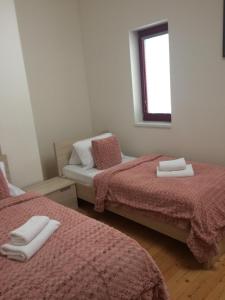 Postel nebo postele na pokoji v ubytování Horský Chalet Harrachov