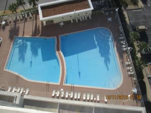 an overhead view of a large swimming pool at 122 Seascape Drive, Unit 1409 in Destin