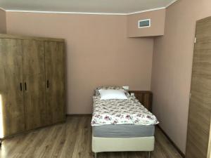 מיטה או מיטות בחדר ב-Apartment KOPA L
