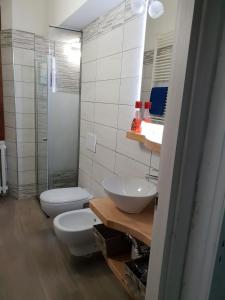 Kúpeľňa v ubytovaní APPARTAMENTI DEI MILLE