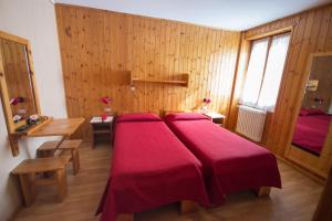 Meublé Albergo Dante客房内的一张或多张床位
