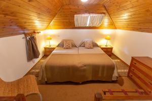 A bed or beds in a room at Valle Paraizo