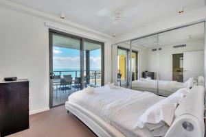 Postel nebo postele na pokoji v ubytování Darwin Waterfront Short Stay Apartments + 37 fotografií