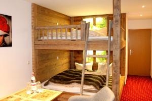 Voodi või voodid majutusasutuse Hotel & Restaurant Grüner Baum - Die Grüne Oase Am Feldberg toas