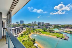 a large building with a view of the ocean at Darwin Waterfront Short Stay Apartments in Darwin