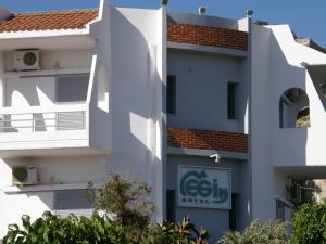 a building with a csis sign on it at Megim Hotel in Palaiochora