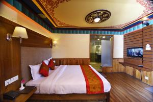 Letto o letti in una camera di Hotel Jampa