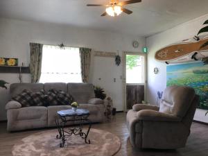 Posezení v ubytování beach house Cg7p