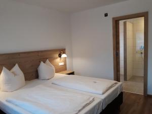 Krevet ili kreveti u jedinici u okviru objekta Hotel Jagdhof