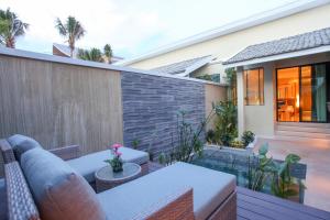 Posezení v ubytování CRAFT Resort & Villas, Phuket Town
