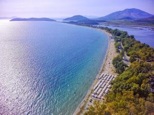 an aerial view of a beach next to the water at Camping Drepanos in Igoumenitsa