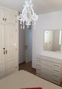A bed or beds in a room at Trendy Homes Apartamento Isleta