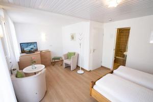 Postel nebo postele na pokoji v ubytování Gästehaus Wissler + 34 fotografií