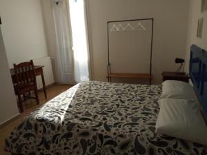 A bed or beds in a room at I Cavalieri di Malta