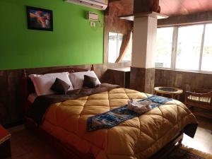 Кровать или кровати в номере Swarajdeep Vacations