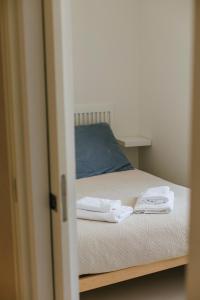 A bed or beds in a room at Preciosas Vistas a Catedral