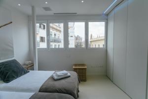 A bed or beds in a room at Preciosas Vistas a Catedral