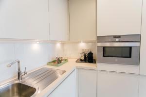 A kitchen or kitchenette at Preciosas Vistas a Catedral