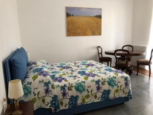 Postel nebo postele na pokoji v ubytování All'Angolo B&B + 3 fotografie