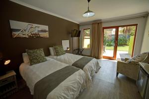 Tempat tidur dalam kamar di Organic Stay Guesthouse