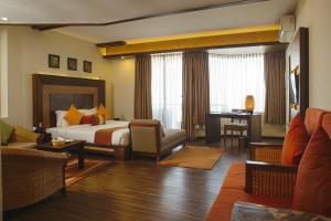 Tempat tidur dalam kamar di Hotel Mystic Mountain